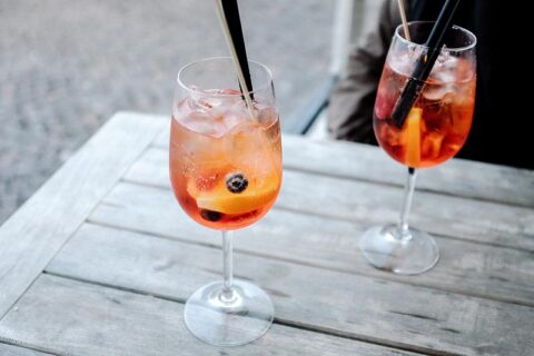 soft drink kept on a wooden table
