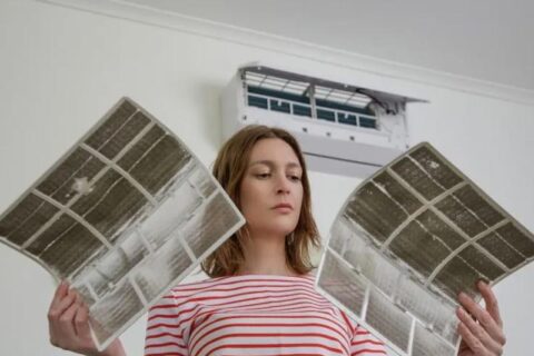 technician cleaning dust