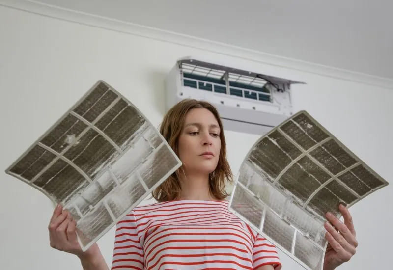 women holding air filters