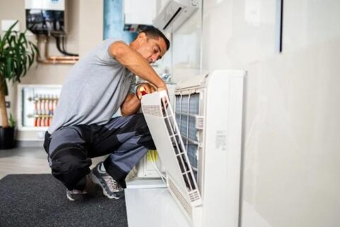 technician cleaning dust