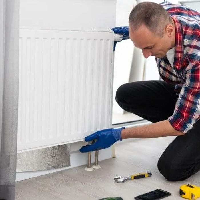 technician working on home heater